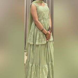 Selling this light green lehenga with silver detailings